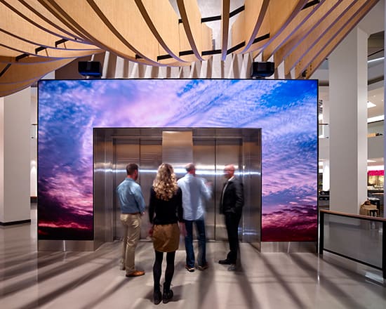 elevator with digital signage surround